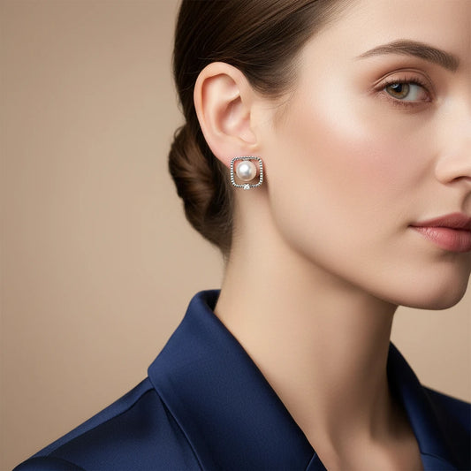 Square sterling silver stud earrings with freshwater pearls and crystal accents on white background.